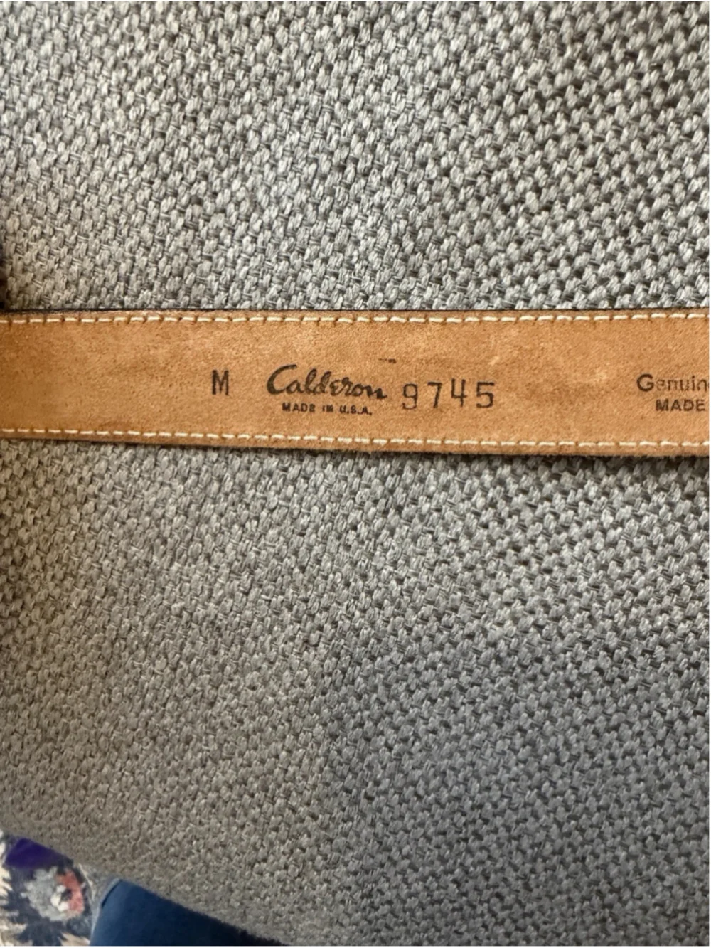 Calderon tan leather belt features a western-style engraved silver buckle